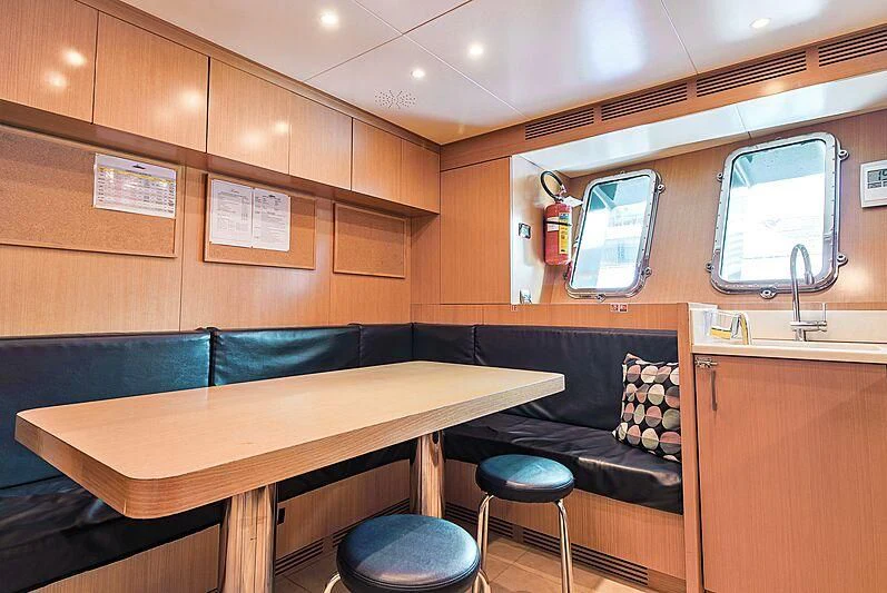 a room with a desk and a chair aboard FORWIN Yacht for Sale