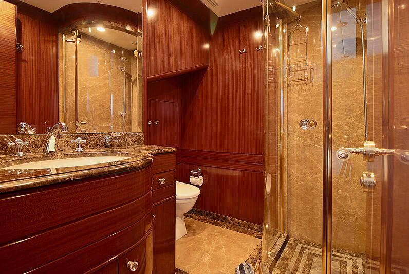 a bathroom with a shower and sink aboard FORWIN Yacht for Sale