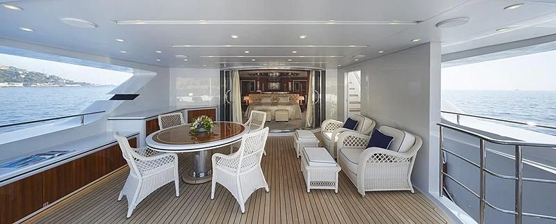 a large living room with a balcony aboard FORWIN Yacht for Sale