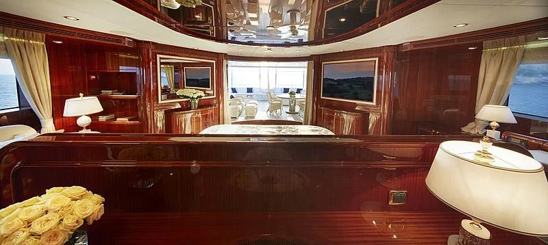 a room with a table and chairs aboard FORWIN Yacht for Sale