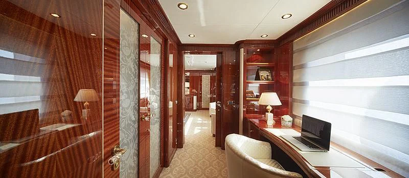 a room with a desk and a laptop aboard FORWIN Yacht for Sale
