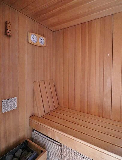 a wooden wall with wooden furniture aboard FORWIN Yacht for Sale