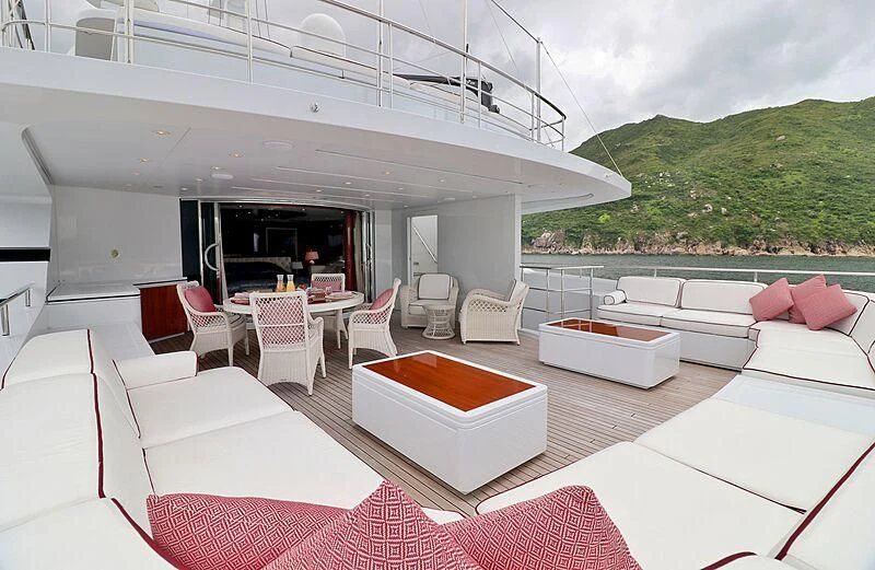 a room with a table and chairs aboard FORWIN Yacht for Sale