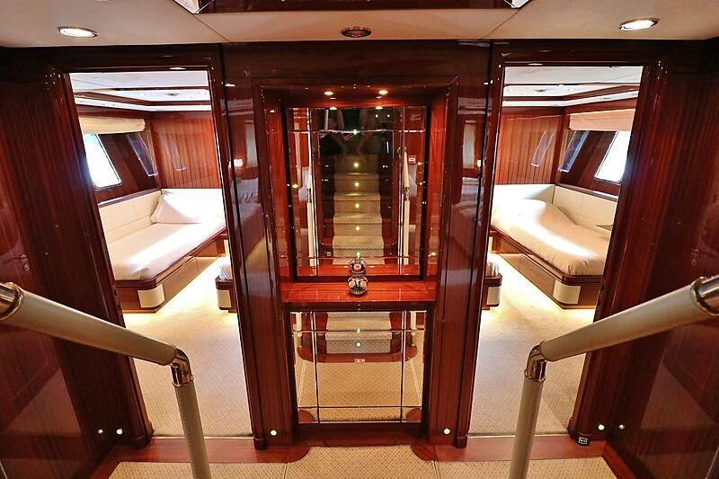 a room with a wood cabinet and a mirror aboard FORWIN Yacht for Sale