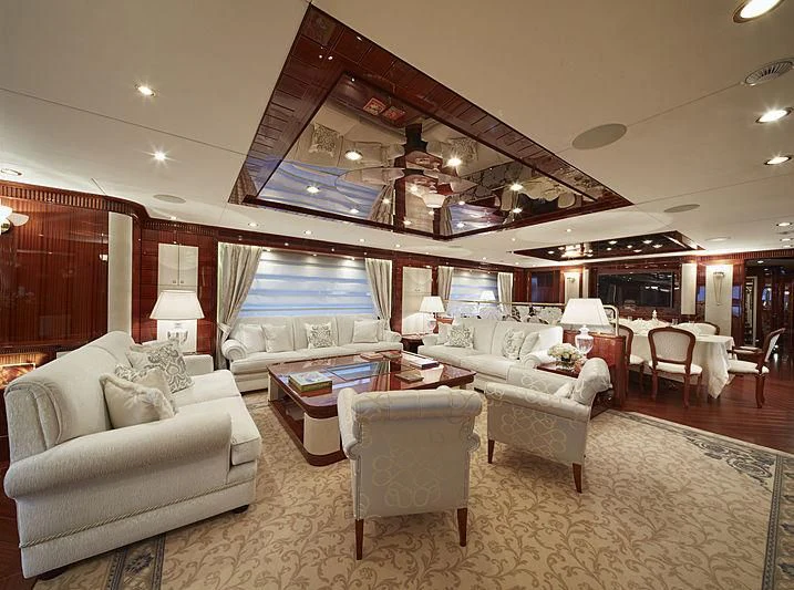 a living room with a large open window aboard FORWIN Yacht for Sale