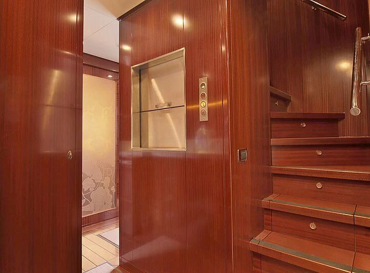 a wooden cabinet with a mirror aboard FORWIN Yacht for Sale