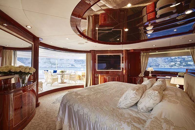 a bedroom with a large bed aboard FORWIN Yacht for Sale