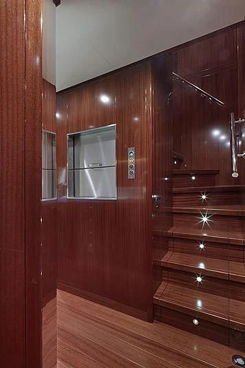 a wooden room with wooden cabinets aboard FORWIN Yacht for Sale