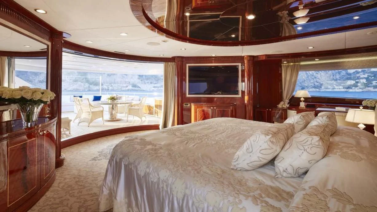 a bedroom with a large bed aboard FORWIN Yacht for Sale