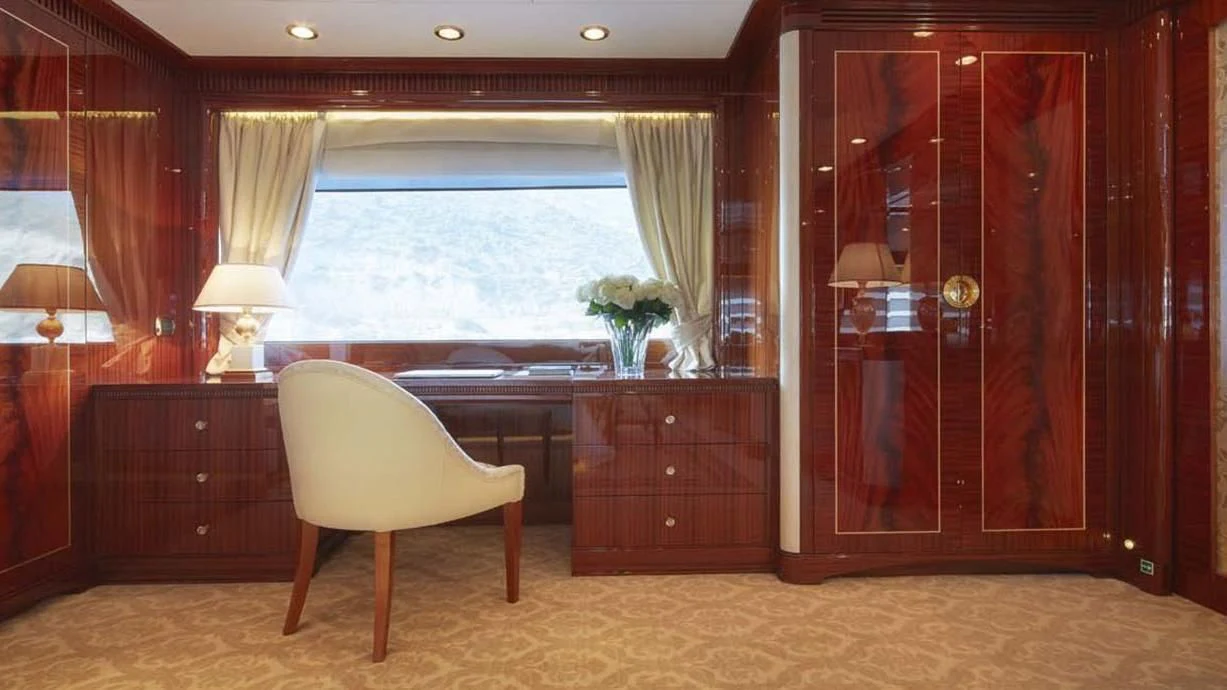 a room with a desk and a chair aboard FORWIN Yacht for Sale