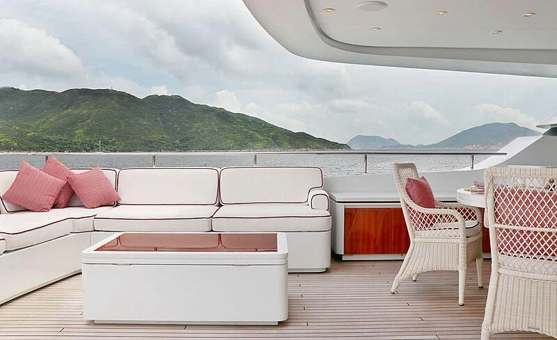 a room with a couch and chairs aboard FORWIN Yacht for Sale