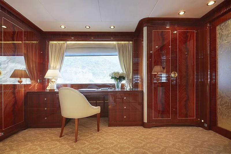 a room with a desk and a chair aboard FORWIN Yacht for Sale
