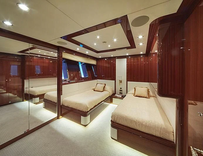a room with a bed and a couch aboard FORWIN Yacht for Sale