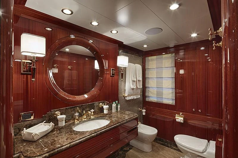 a bathroom with a large mirror aboard FORWIN Yacht for Sale