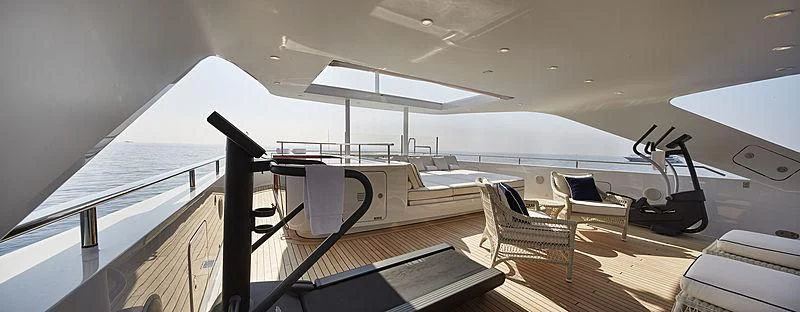 a room with a bed and a chair aboard FORWIN Yacht for Sale