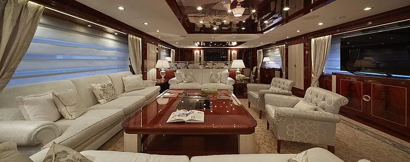 a living room with a couch and a table aboard FORWIN Yacht for Sale