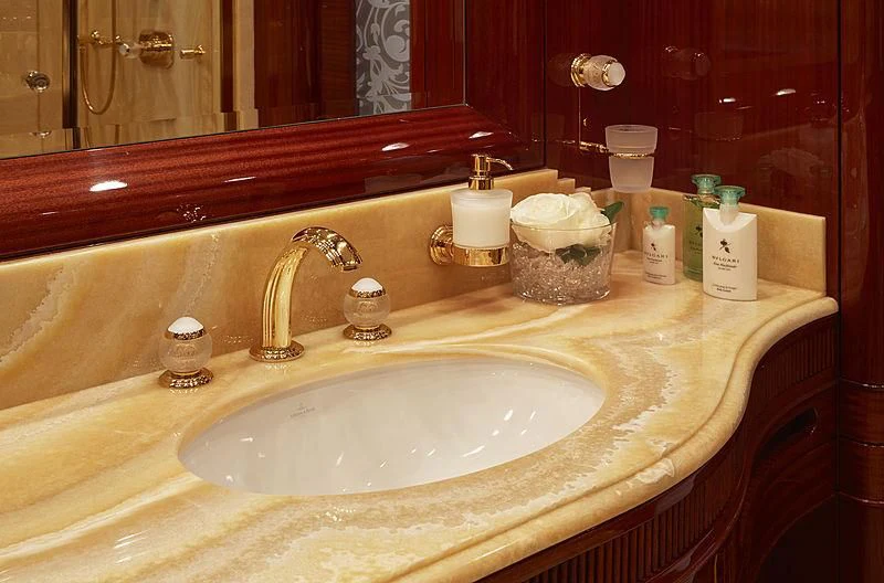 a bathroom sink with a mirror aboard FORWIN Yacht for Sale