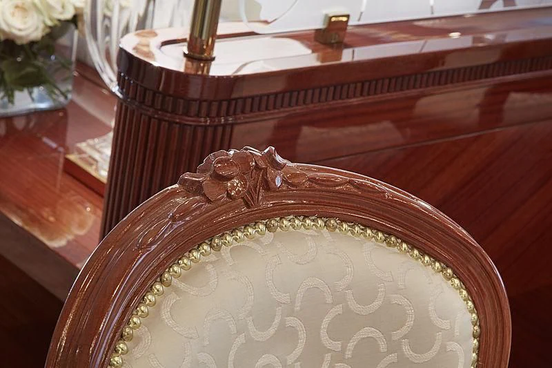 a wooden bell with a gold chain aboard FORWIN Yacht for Sale