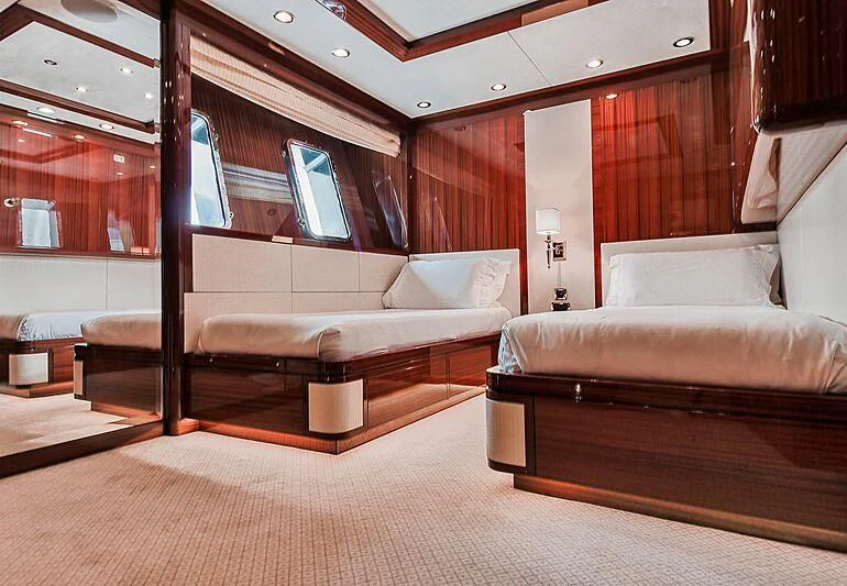 a living room with a couch and a tv aboard FORWIN Yacht for Sale