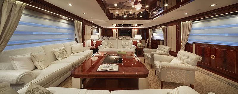 a living room with a couch and a table aboard FORWIN Yacht for Sale