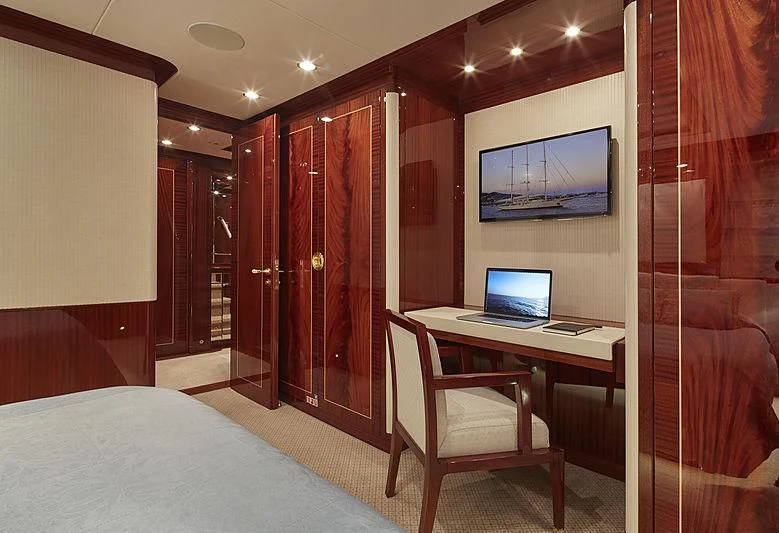 a room with a desk and a laptop aboard FORWIN Yacht for Sale