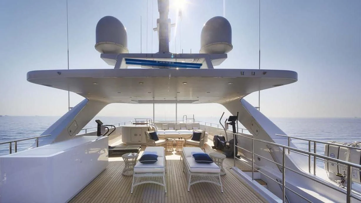 a large military aircraft on a deck aboard FORWIN Yacht for Sale