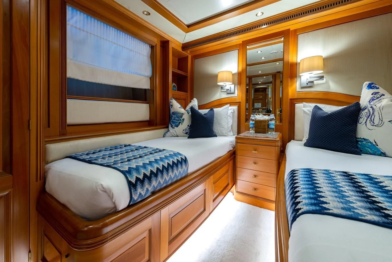 a couple of beds in a hotel room aboard NEW STAR Yacht for Charter