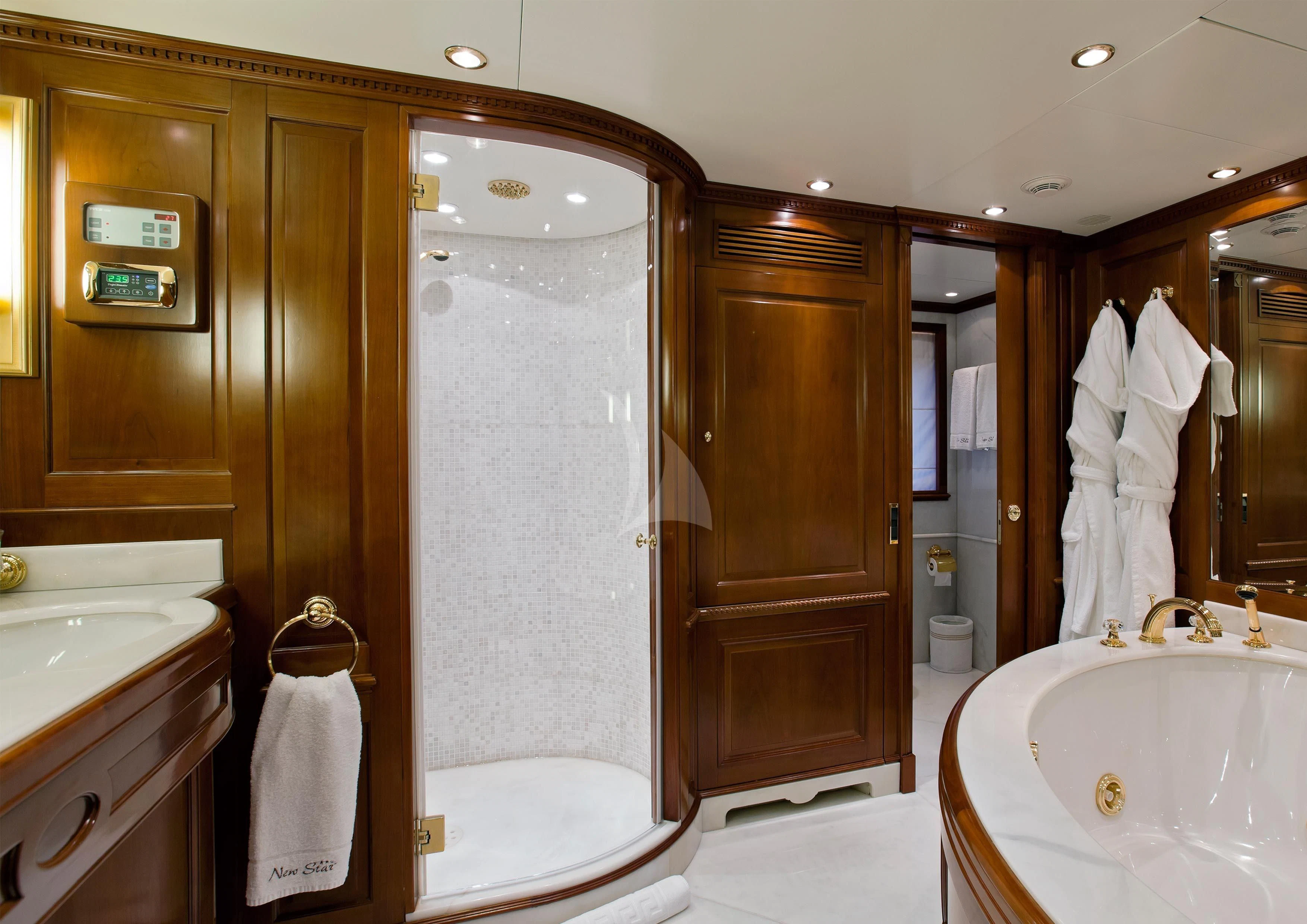 a bathroom with a shower and sink aboard NEW STAR Yacht for Charter