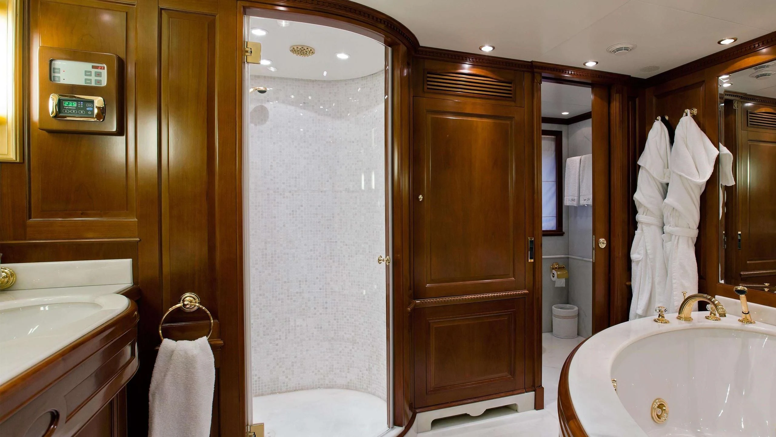 a bathroom with a sink and a shower unit aboard NEW STAR Yacht for Charter
