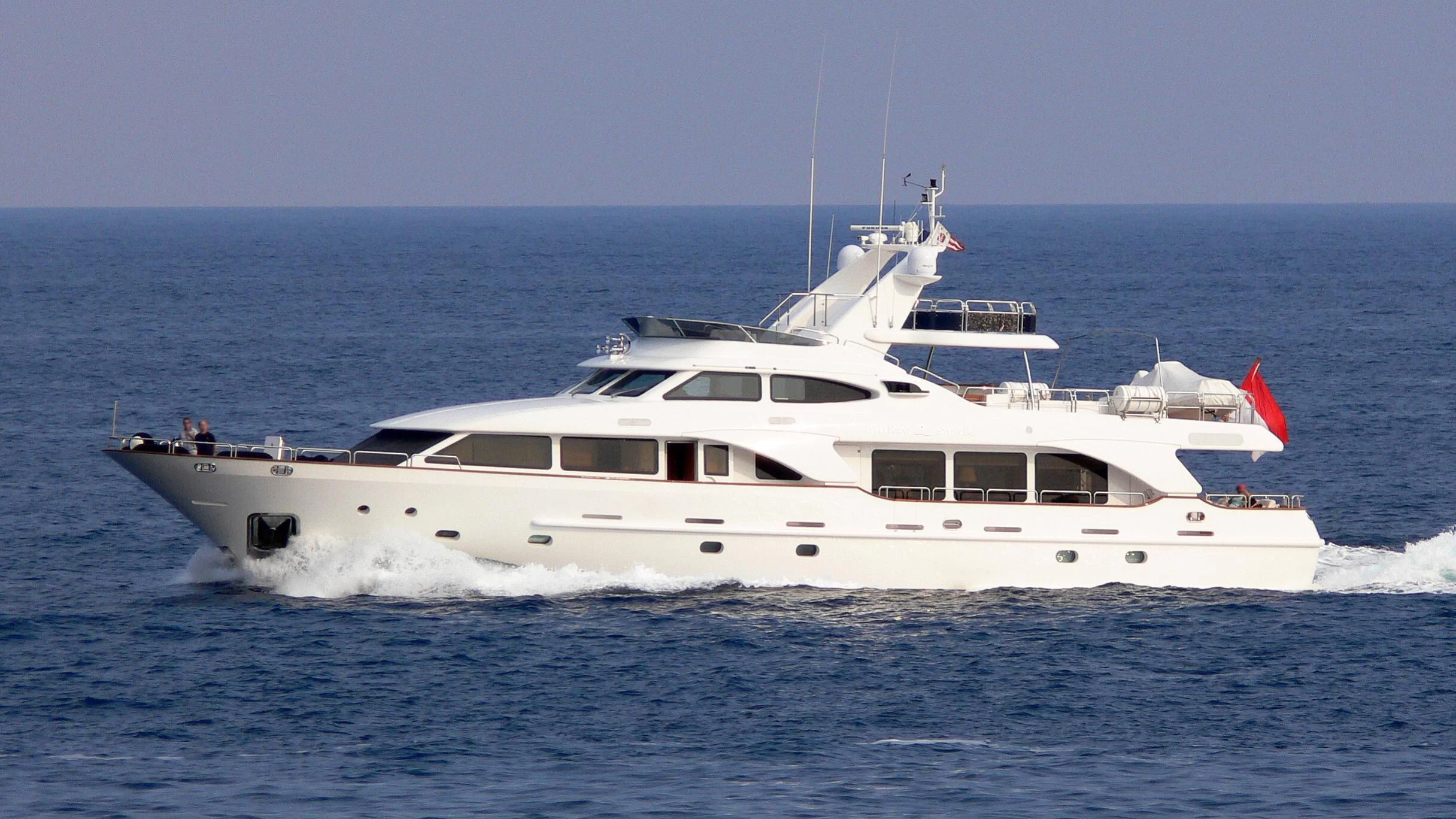 a white yacht in the water aboard NEW STAR Yacht for Charter