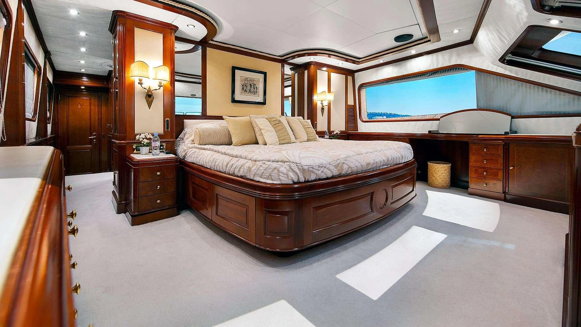 a large bedroom with a bed aboard NEW STAR Yacht for Charter