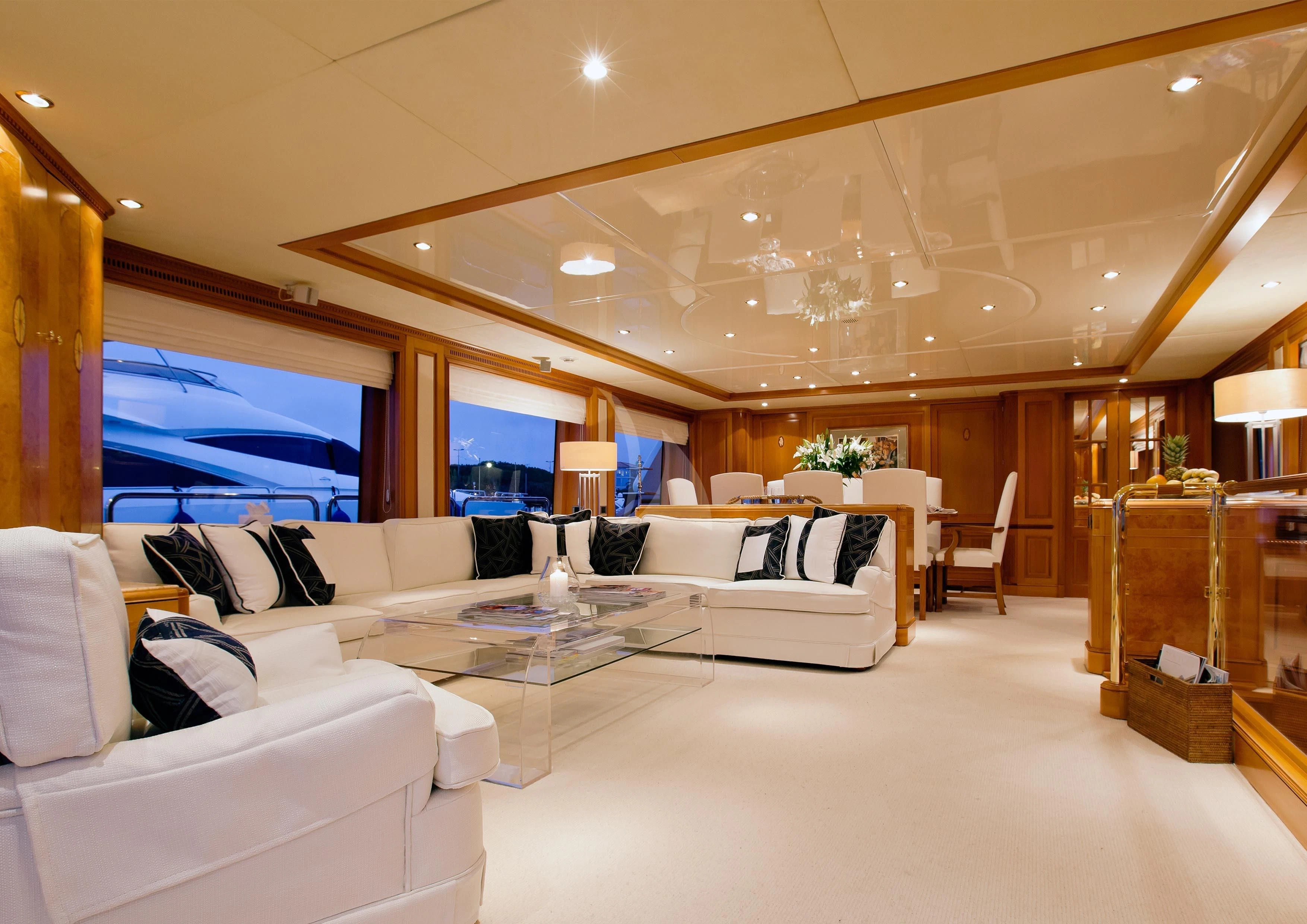 a living room with a large window aboard NEW STAR Yacht for Charter