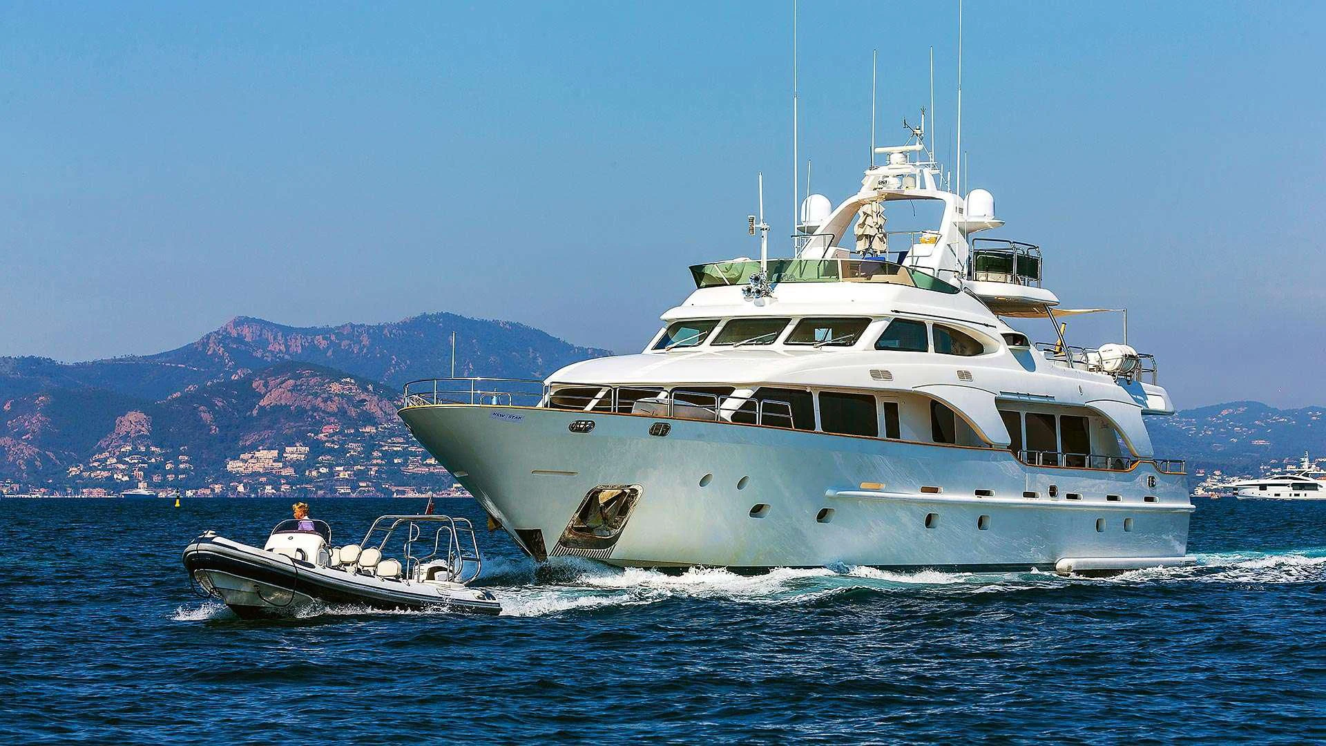 a couple of boats on the water aboard NEW STAR Yacht for Charter