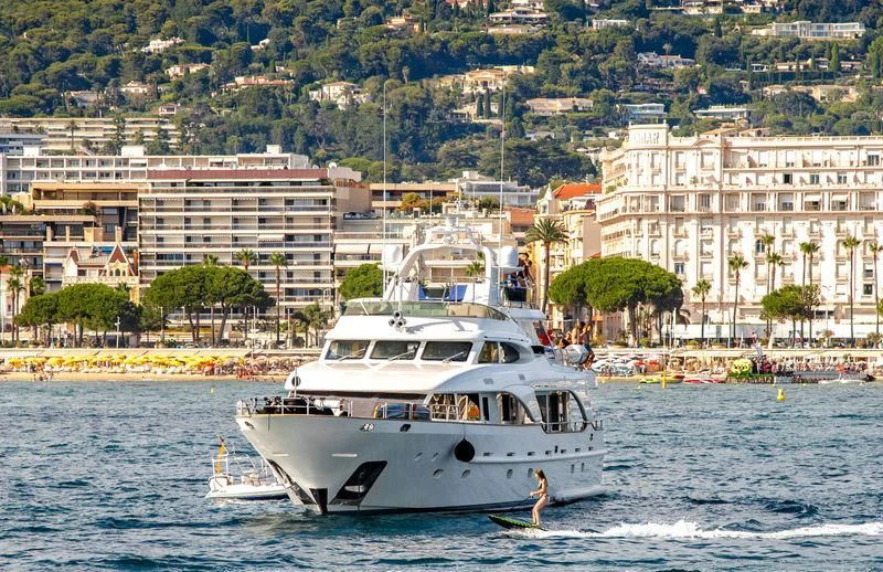 a white boat on the water aboard NEW STAR Yacht for Charter