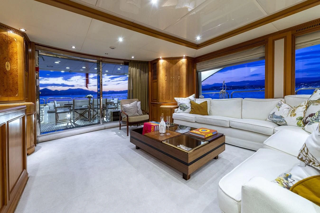 a living room with a large window aboard NEW STAR Yacht for Charter