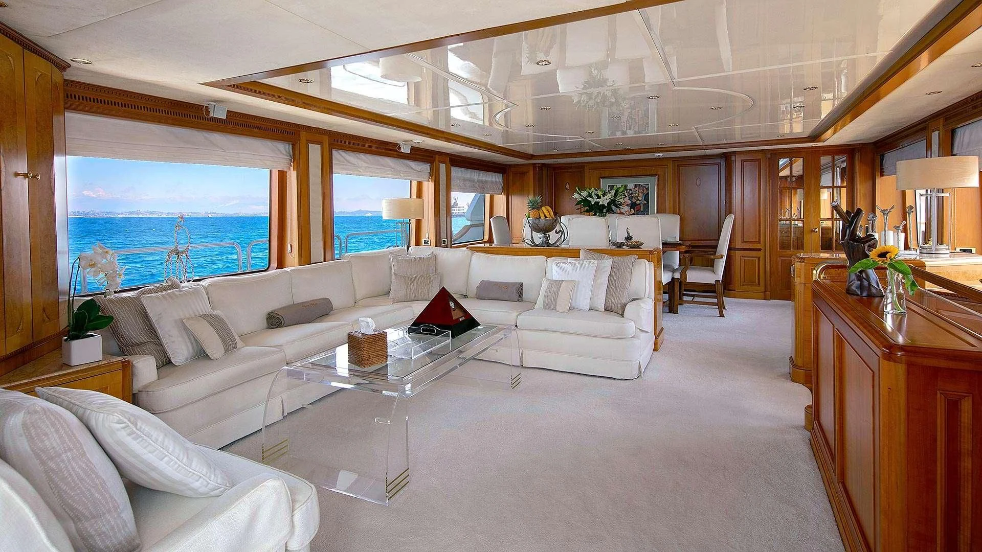 a living room with a large window aboard NEW STAR Yacht for Charter