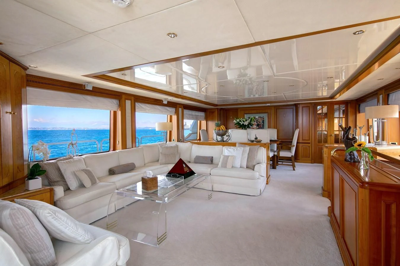 a living room with a large window aboard NEW STAR Yacht for Charter