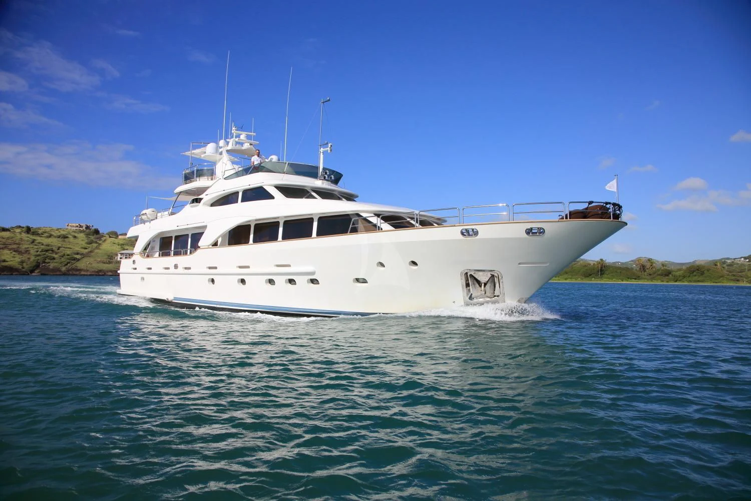 a white boat in the water aboard NEW STAR Yacht for Charter