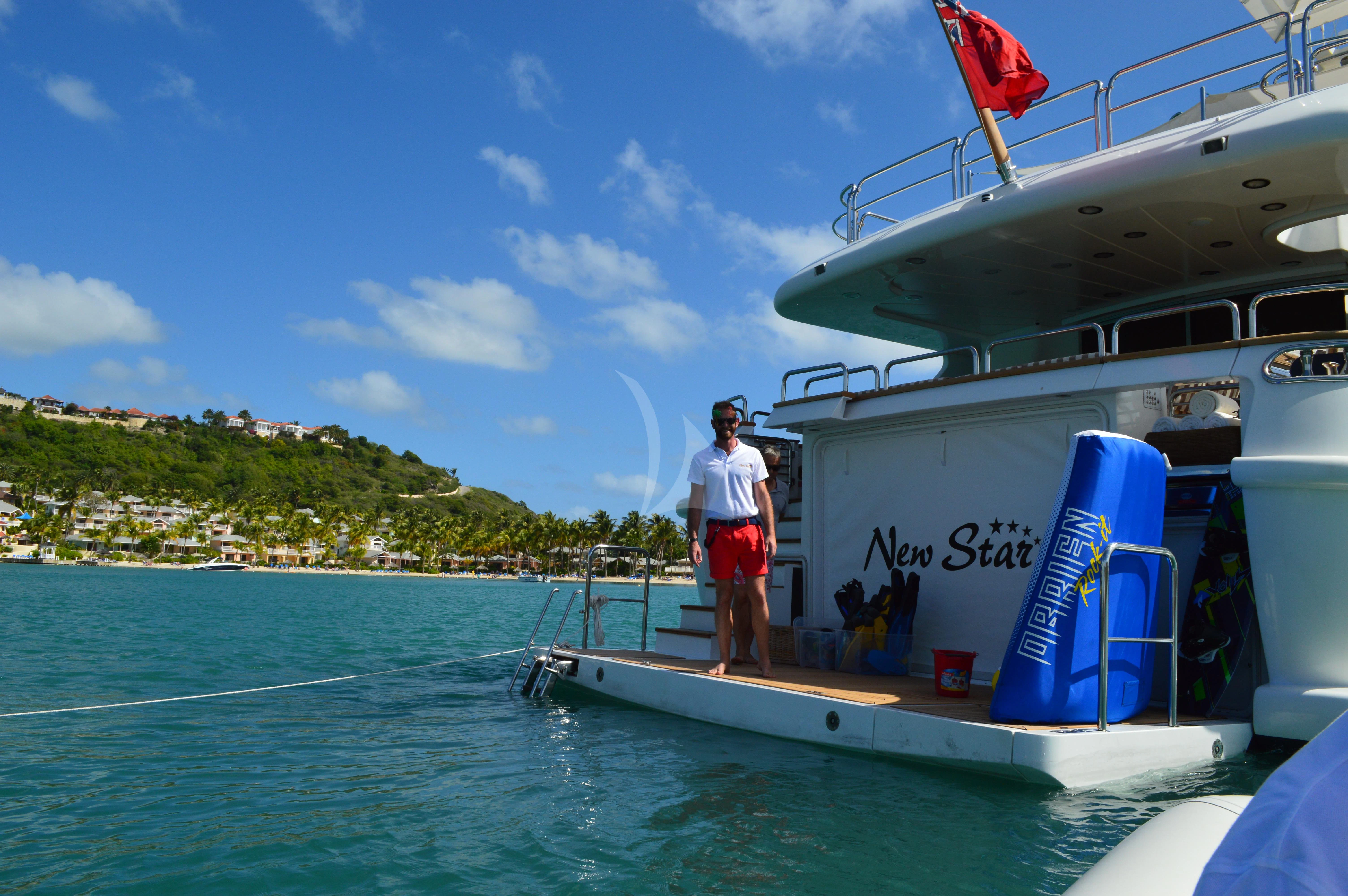 a person standing on a boat aboard NEW STAR Yacht for Charter