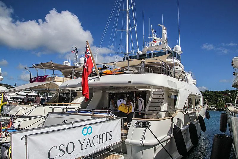 a boat with a flag on the front aboard NEW STAR Yacht for Charter