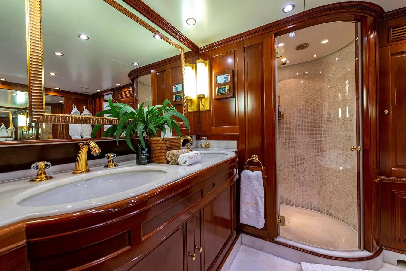 a bathroom with a large mirror aboard NEW STAR Yacht for Charter
