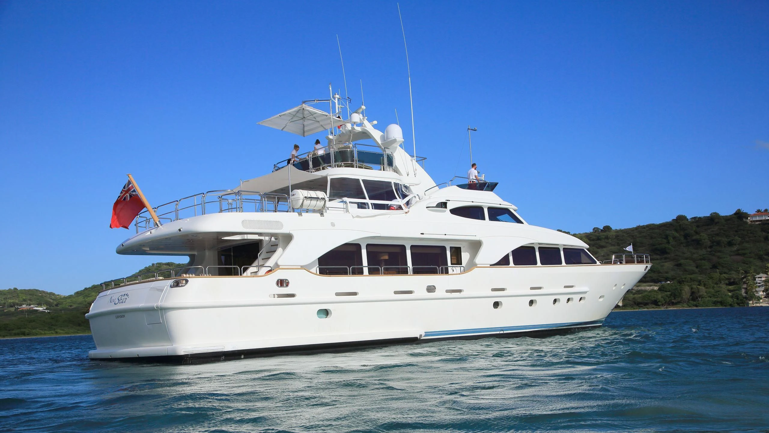 a white yacht on the water aboard NEW STAR Yacht for Charter