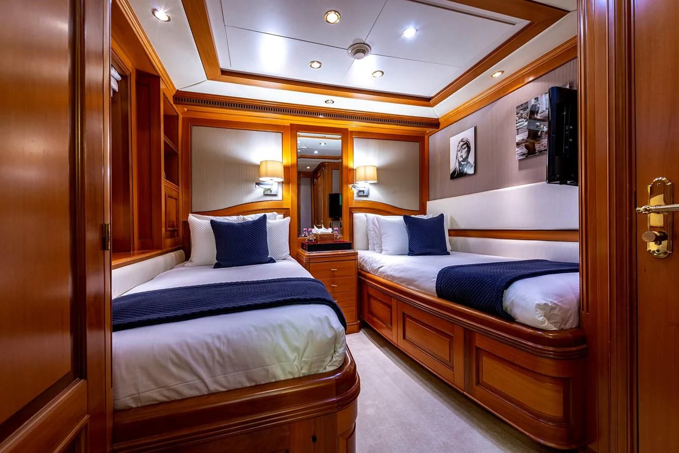 a room with two beds aboard NEW STAR Yacht for Charter