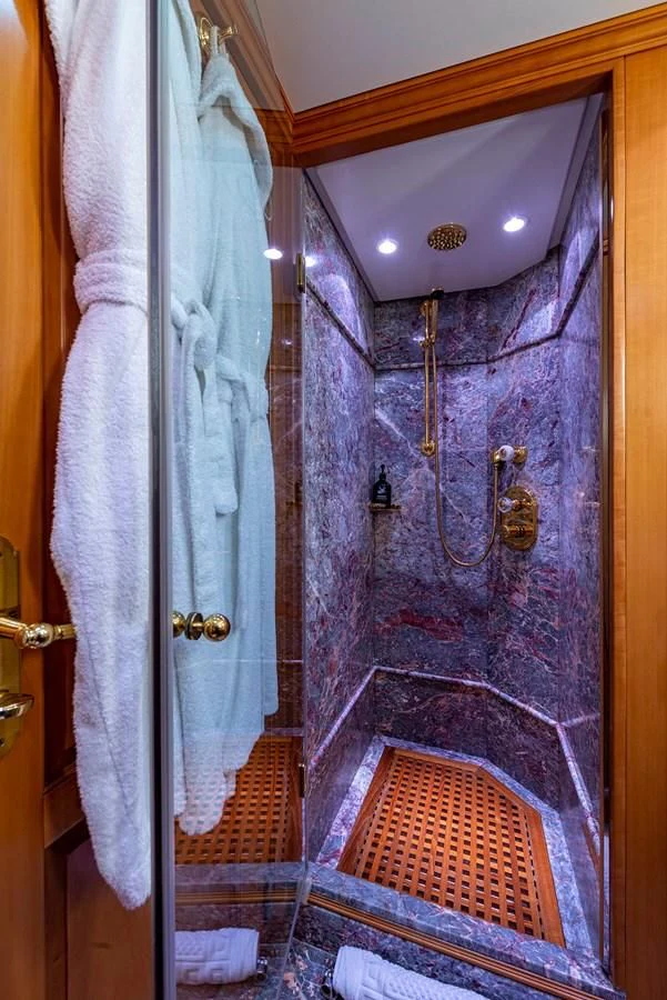 a blue door with a curtain aboard NEW STAR Yacht for Charter