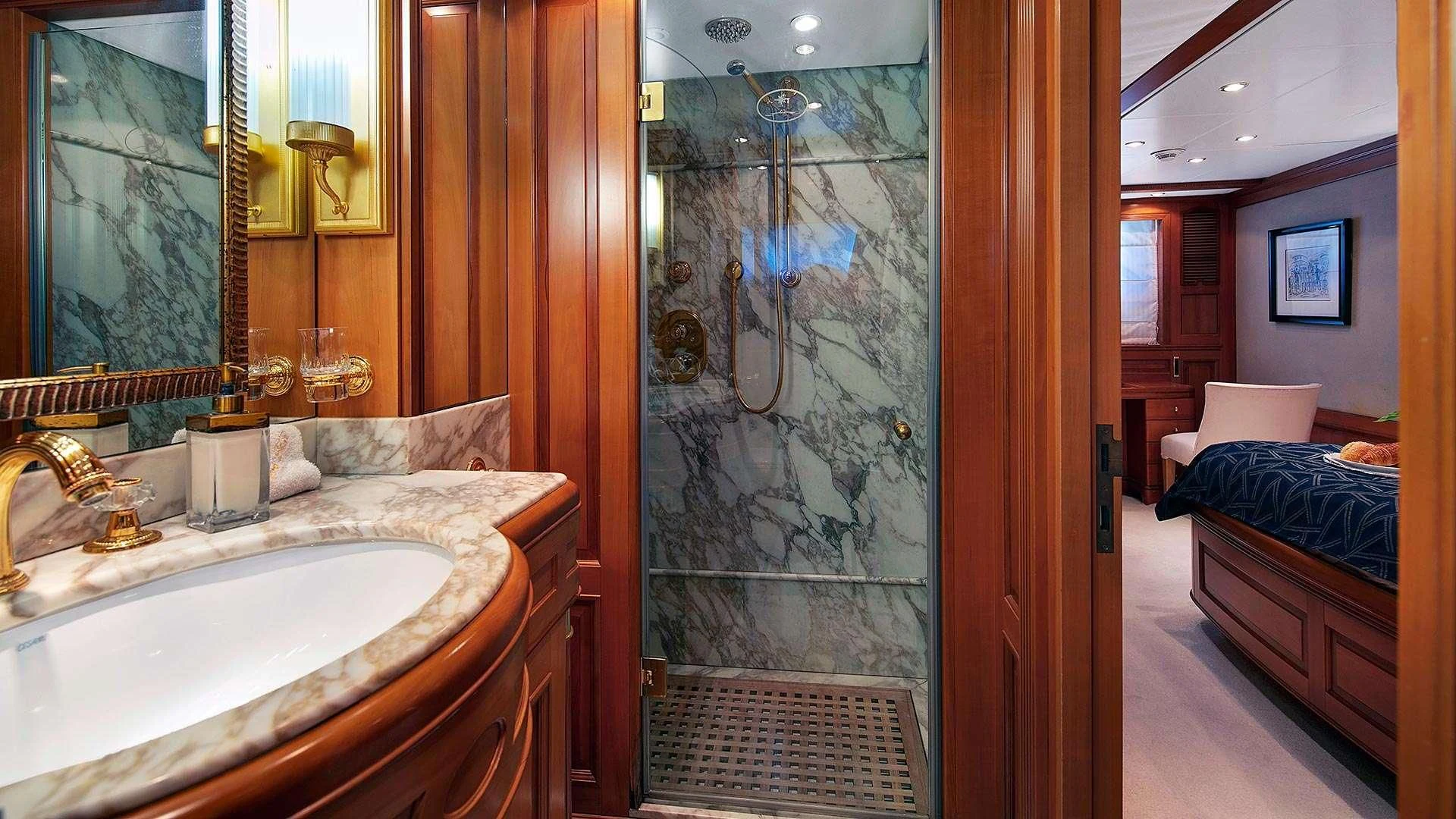 a bathroom with a glass shower aboard NEW STAR Yacht for Charter