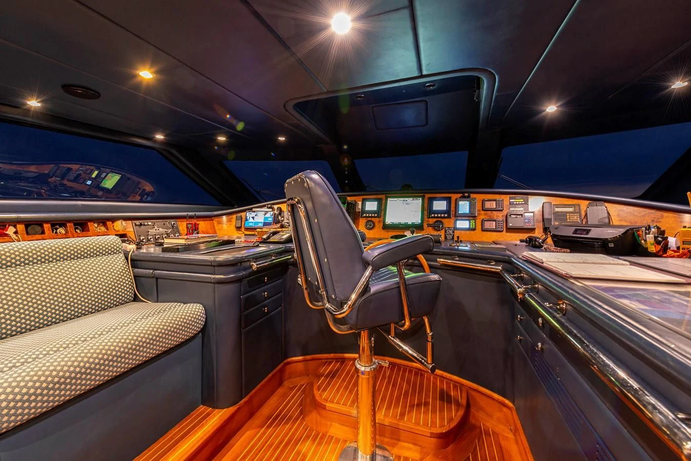 a vehicle with a seat and a chair in the back aboard NEW STAR Yacht for Charter