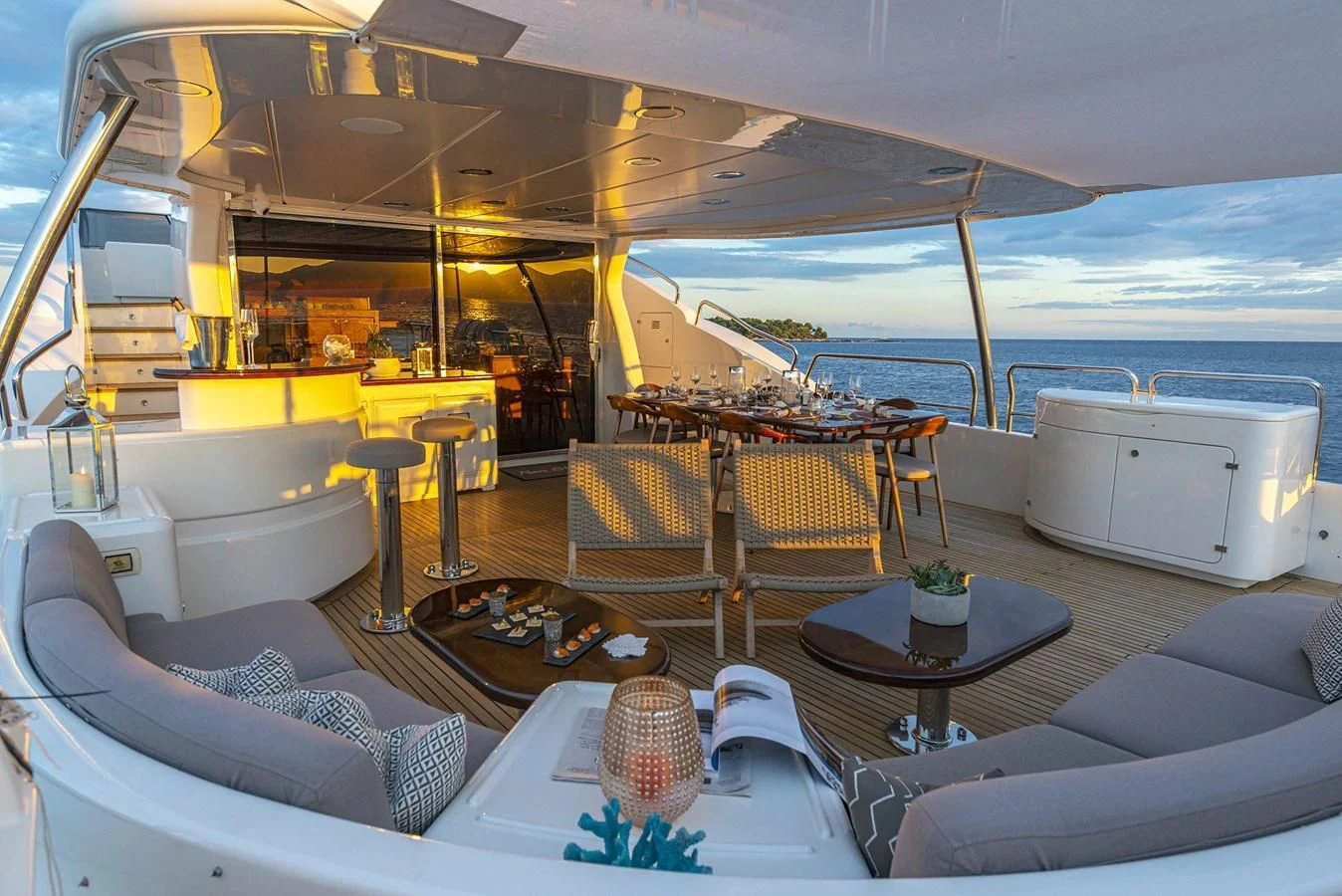 a boat with a table and chairs aboard NEW STAR Yacht for Charter