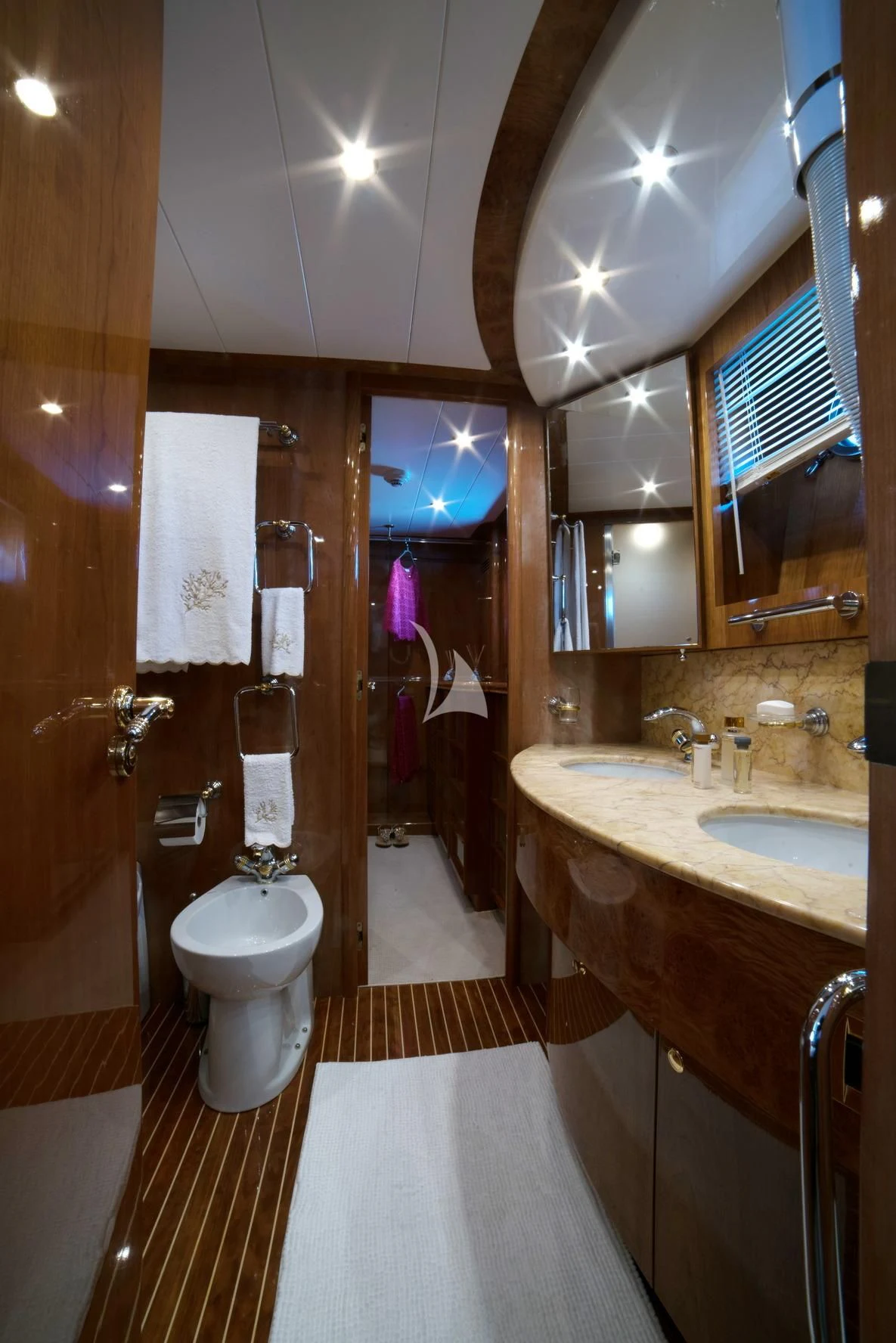 a bathroom with a toilet and a sink aboard D'ARISTOTELIS Yacht for Sale