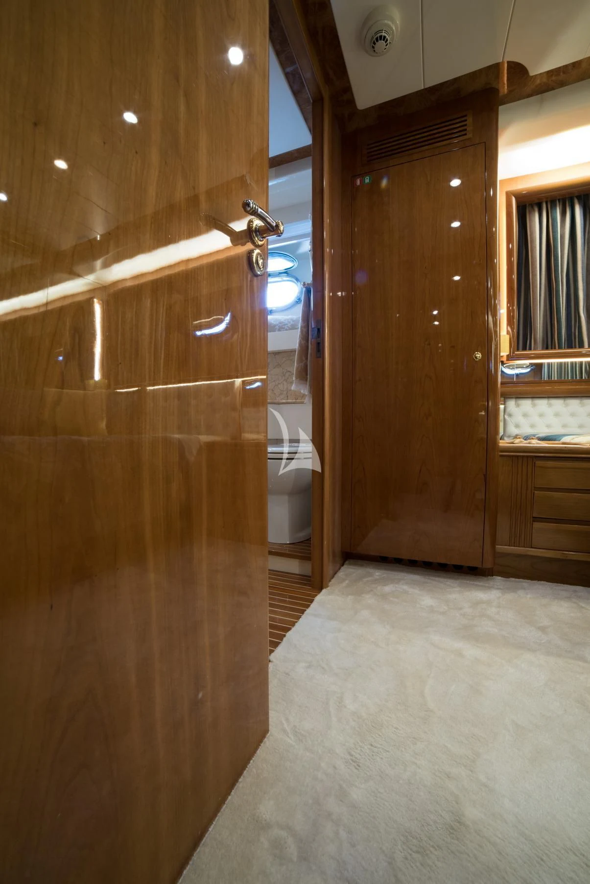 a bathroom with wooden cabinets aboard D'ARISTOTELIS Yacht for Sale
