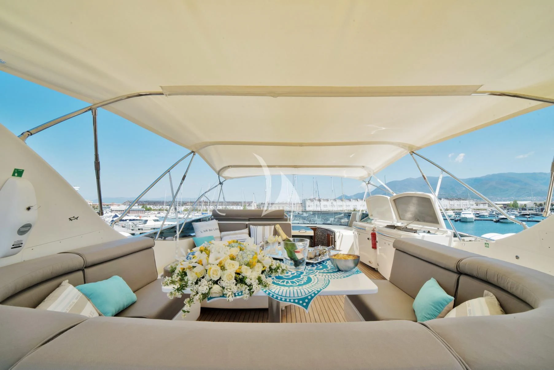 a tent with a table and flowers on it aboard D'ARISTOTELIS Yacht for Sale